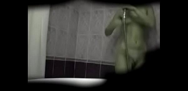  Young woman spy shower